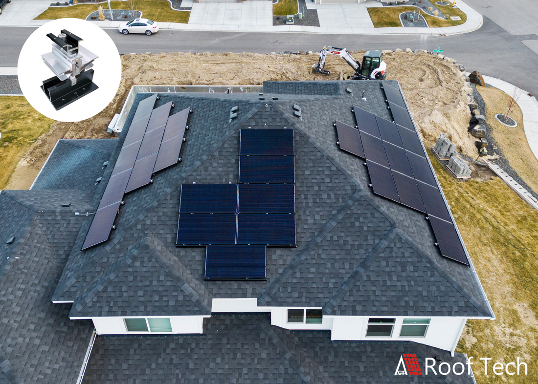 Two story home with three arrays of solar panels mounted with Roof Tech's RT-APEX with AlphaSeal.